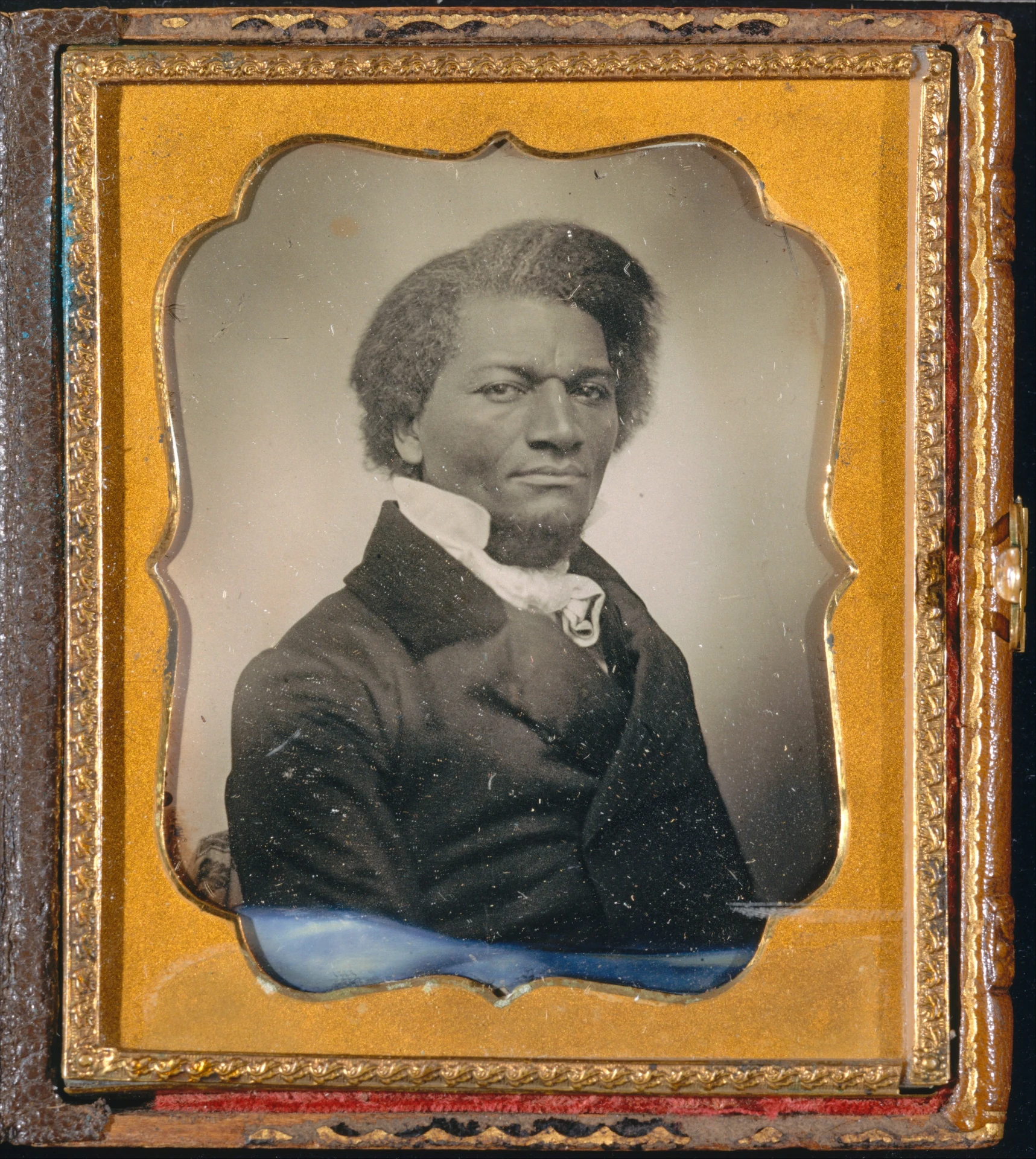 Scratched circa-1855 daguerreotype of Frederick Douglass before restoration