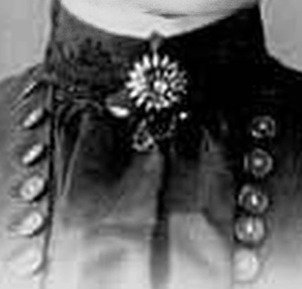 Brooch and buttons upscaled 4x with Topaz Detail Faces, crop at 100%